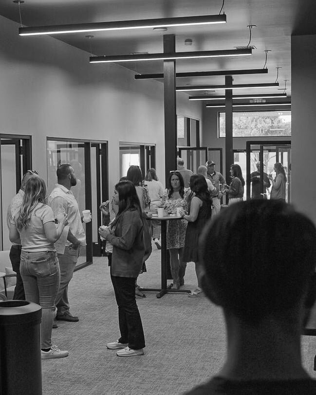 Tenants and guests networking at an Avenue 118 event